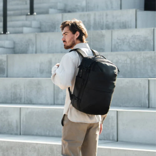 Traveller wearing the Flovir Air Travel Bag